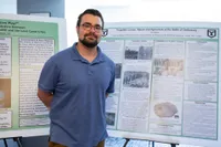 Ian Miller with his research project 