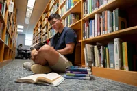 Student studying in Schmidt Library 