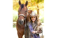 Kylie Good, Congress Queen, poses with her horse. 