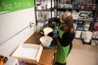 A Chemistry student making soap for her own company 