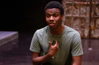 Acell Spencer acting in the play, Because They Have No Words 