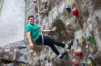 Noah Carnuccio climbing rock wall 