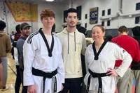 Taekwondo Siblings and their instructor. 