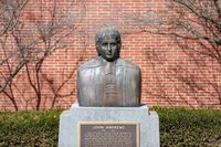 A bust of founder Rev. John Andrews sits outside on the campus quad