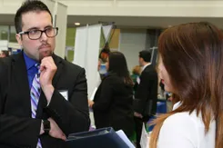 Student interacts with employer at the Career Expo.