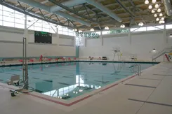The pool is home to recreational swimmers, varsity swim teams, & physical education classes, and holds roughly 460,000 gallons of warm 79° water.