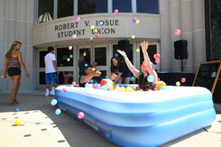 Students having fun in kiddie pool