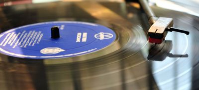 Record plays music on a player.