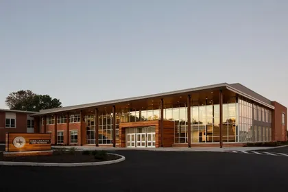 The front entrance of the York Country Day School at sunset 