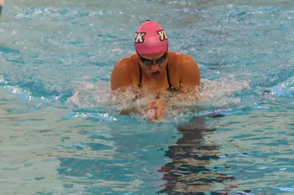 Isabella Klemm swimming in the pool during a meet. 