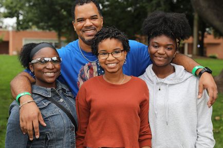 A family attends Fall Fest and Homecoming Weekend