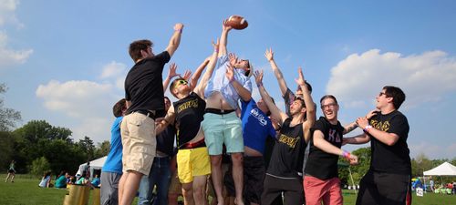 Greeks playing football during a York College Relay for Life event