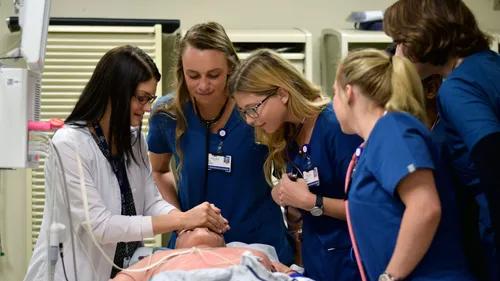 Respiratory Care students demonstrate how to check airways.