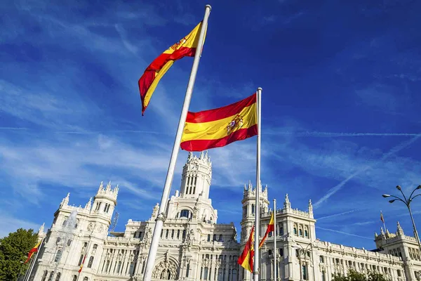 Stock photo of the Spanish flag flying.